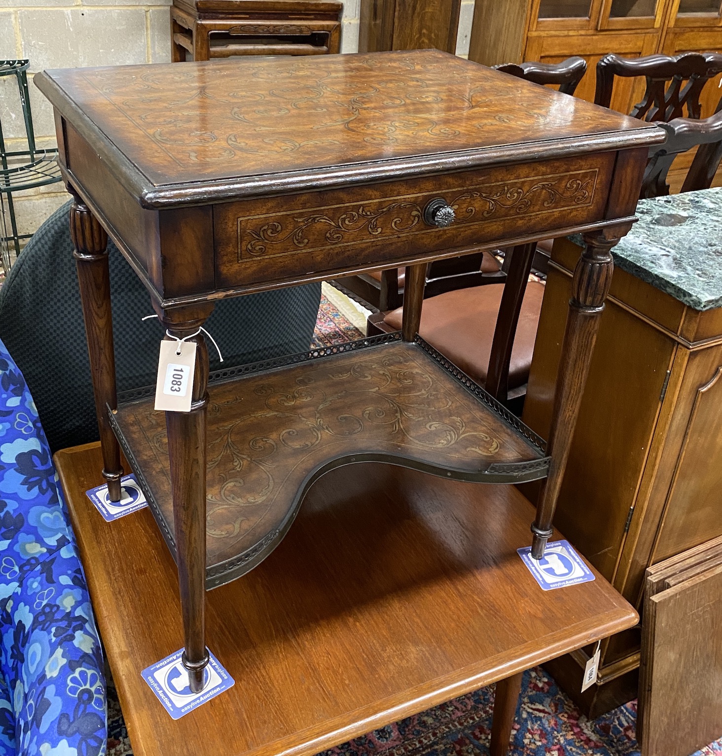 A Theodore Alexander faux marquetry walnut two tier table, width 66cm, depth 51cm, height 72cm